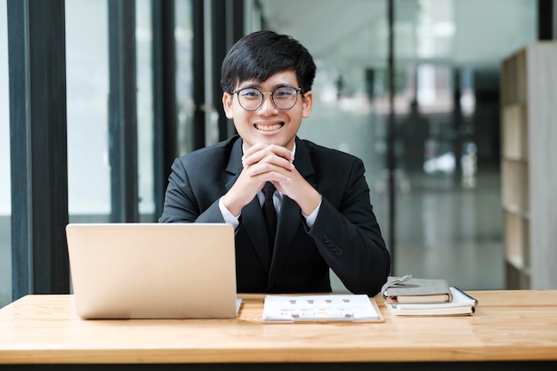 Businessman working at office using laptop