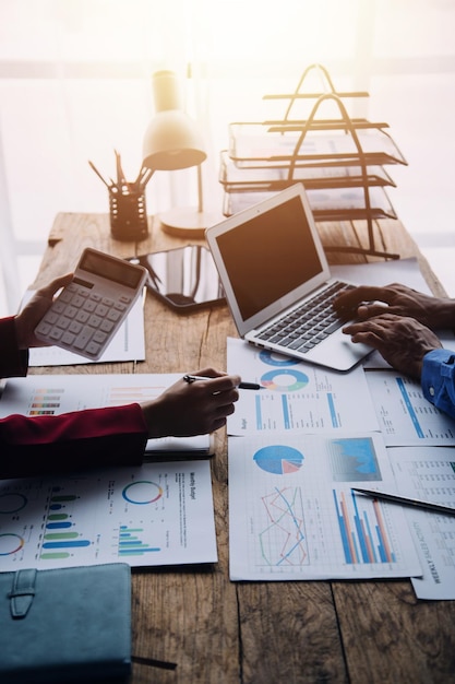 Businessman working at office with documents on his desk doing planning analyzing the financial report business plan investment finance analysis concept