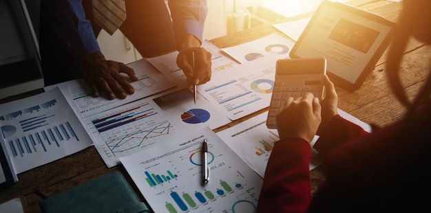 Businessman working at office with documents on his desk doing planning analyzing the financial report business plan investment finance analysis concept