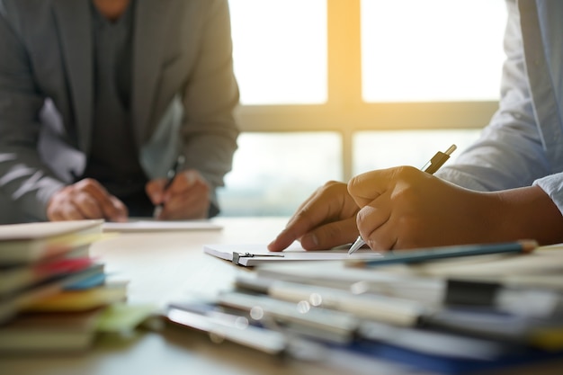 Businessman working reading documents graph financial to job succes Analyze document plans