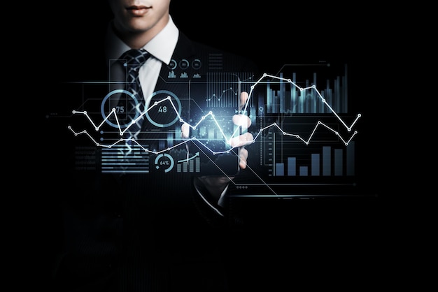 Businessman working with digital finance business graph of perceptive technology