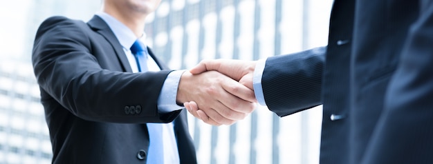 Businessmen making handshake