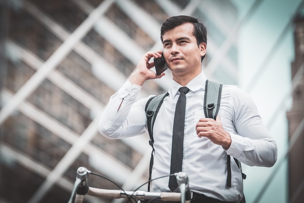 Businessmen riding bicycles