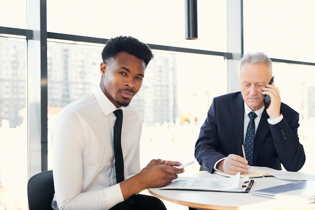 Businessmen working with papers