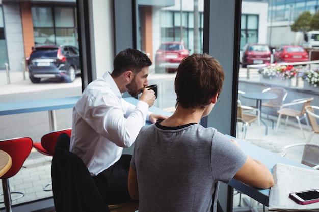 Businesspeople having a cup of coffee