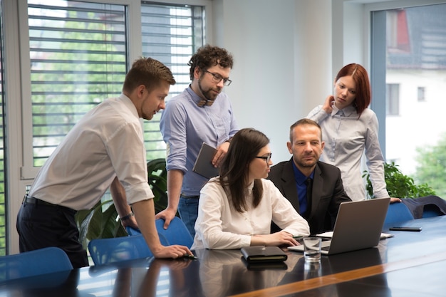 Businesspeople in office working