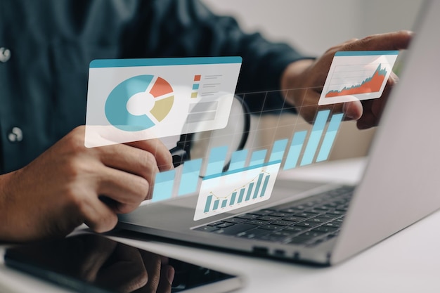 Businesspeople working on a monitor graph dashboard while performing statistical and data analysis for corporate finance and investment ideas