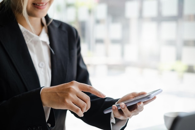 A businesswoman completes KYC using an online banking program in order to open a digital savings account The definition of cyber security