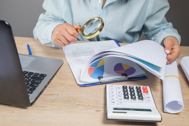 Businesswoman examines data in the office