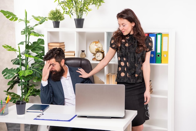 Businesswoman flirting with businessman at workplace flirt