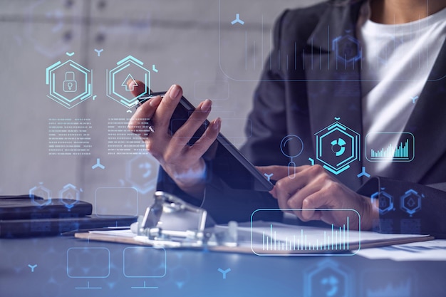 Businesswoman in formal wear checking the phone to sign the contract to create a software to present it at start up conference and gain investments for innovative service Hologram tech graphs