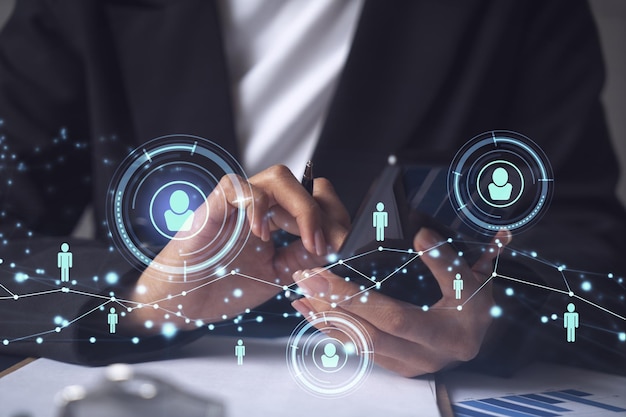 Businesswoman in formal wear checking the phone to sign the employment agreement to boost her career and gain new opportunities in personal growth Concept of success Social media hologram icons