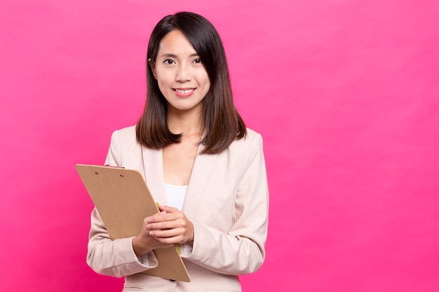 Businesswoman hold with clipboard