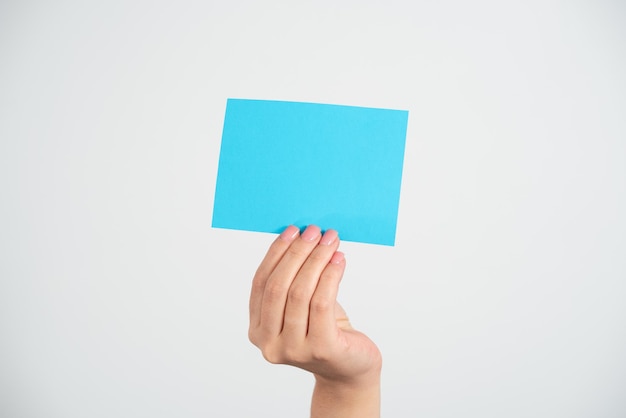 Businesswoman Holding Note With Important Message With One Hand Woman Presenting Crutial Information On Piece Of Paper Executive Showing Critical Announcement