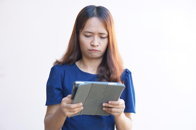 Businesswoman looking at laptop computer screen desperately losing business