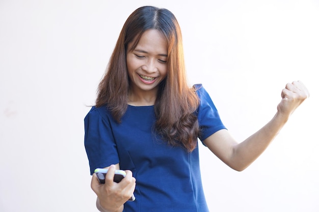 Businesswoman looking at a portable computer monitor Glad to have more profitx9