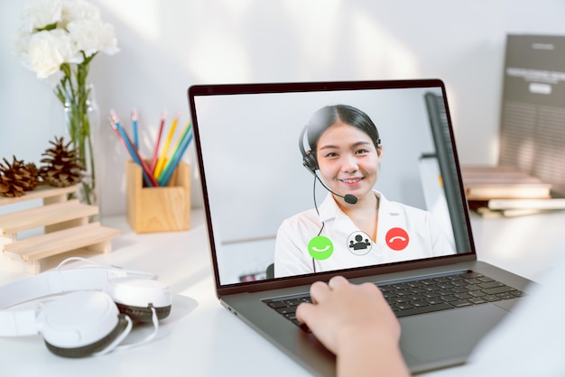 Businesswoman making video call to customer support online.