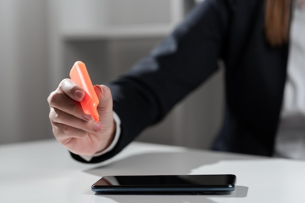 Businesswoman Pointing With Marker On Important Messages On Desk With Phone Executive In Suit Presenting Crutial Informations With Coloring Pen On Table With Tablet