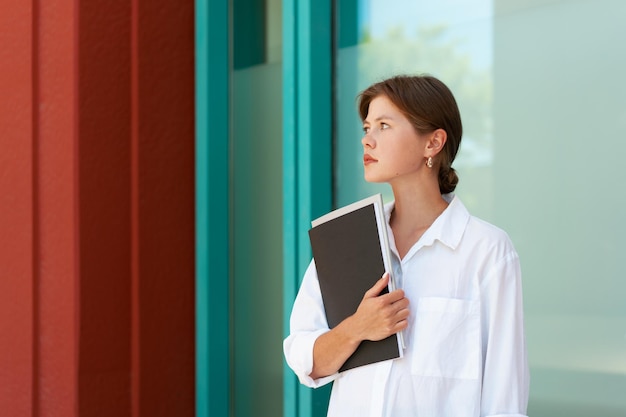 Businesswoman portrait Caucasian female business person standing outdoor