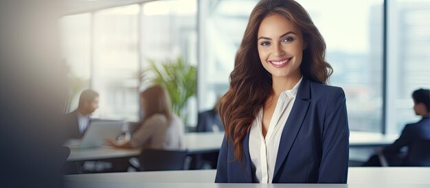 Businesswoman smiling in office with empty space