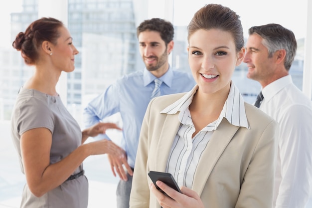 Businesswoman smiling while at work