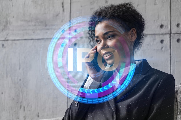 Businesswoman speaks phone and ipo icon hologram Double exposure Initial primary offering invest concept