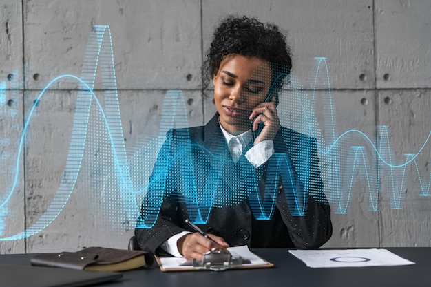 Businesswoman speaks phone and stock market financial graph hologram Double exposure Company statistics study concept