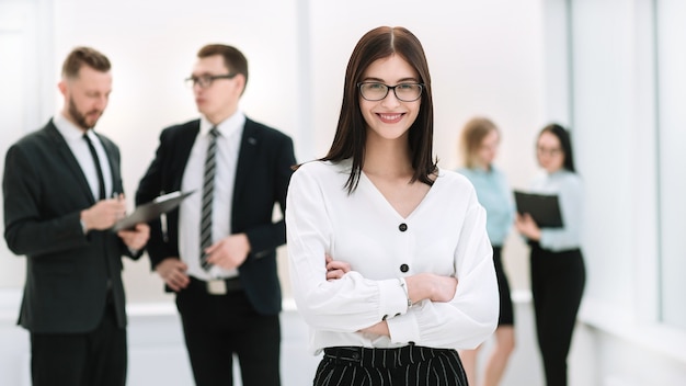 businesswoman standing in the lobby office.