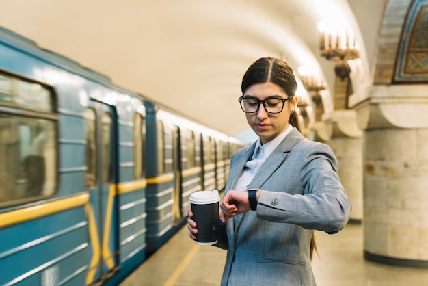 Businesswoman in subway station