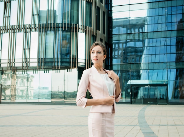 Businesswoman successful woman business person standing outdoor corporate building exterior