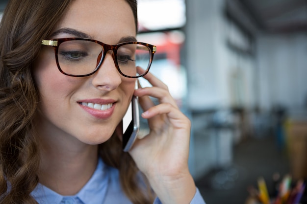 Businesswoman talking on mobile phone