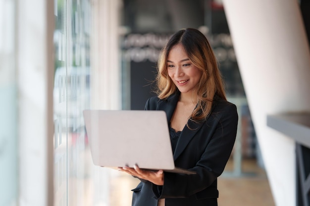 Businesswoman teacher or mentor coach speaking to customer about financing by video call Finance concept