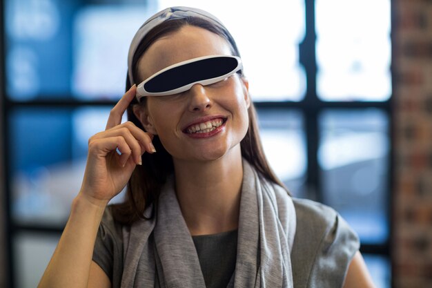 Businesswoman using virtual reality headset