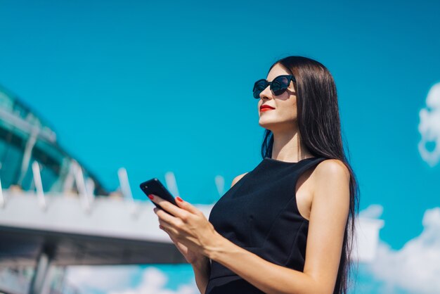 businesswoman wearing elegant black dress