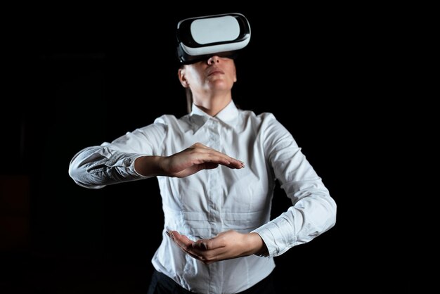 Businesswoman wearing virtual reality headset and gesturing while taking professional training