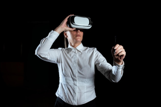 Businesswoman Wearing Virtual Reality Simulator And Holding Pen Woman Wearing Vr Headset While Attending Professional Training Through Modern Technology