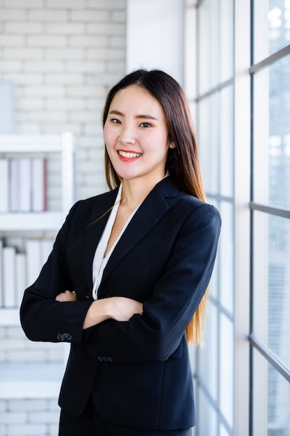 Businesswoman with her arms crossed