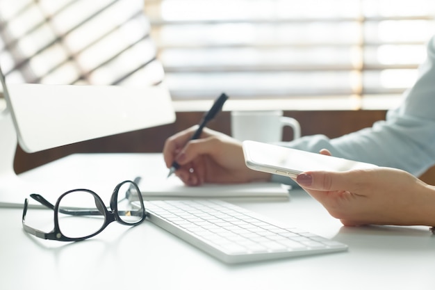 Businesswoman working at her office