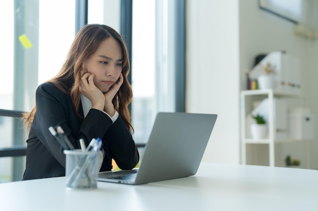 Businesswoman working on a laptop for business information