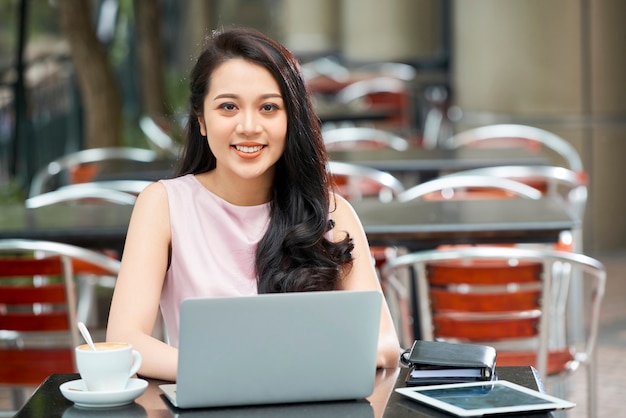 Businesswoman working on laptop