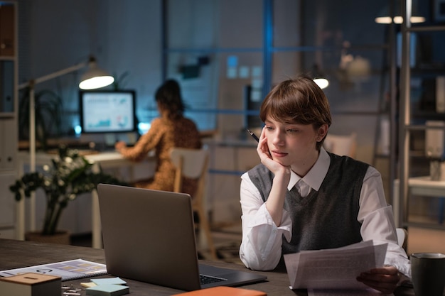 Businesswoman working till late at office