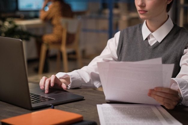 Businesswoman working with documents at office