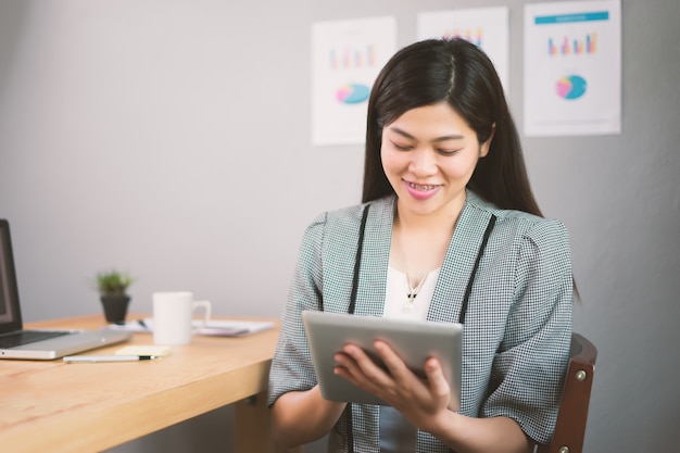 businesswoman working with modern devices, student girl using digital tablet computer