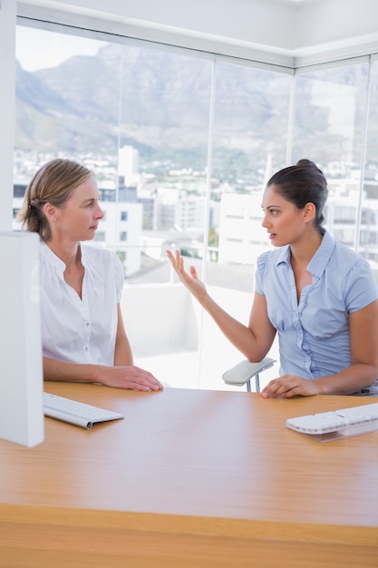 Businesswomen arguing in the office