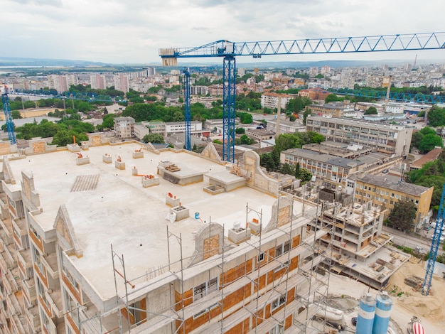 Busy Construction Site and Construction Equipment Aerial view