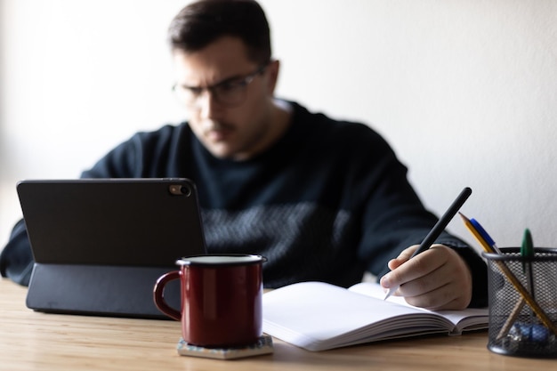 A busy man is focus on working at home