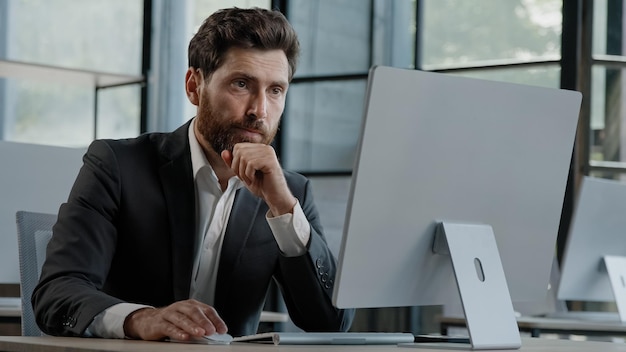 Busy pensive focused caucasian bearded adult s man ceo company worker manager boss businessman