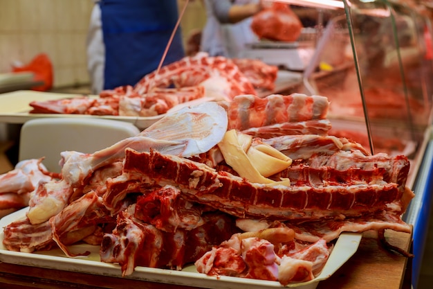 Butcher Preparing Meat In Shop