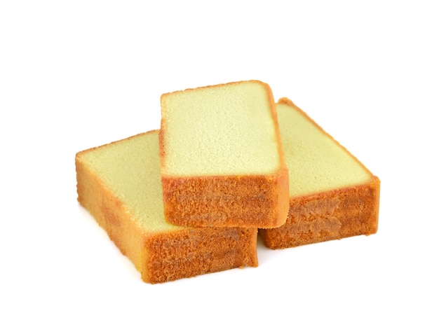 Butter cake sliced on white background