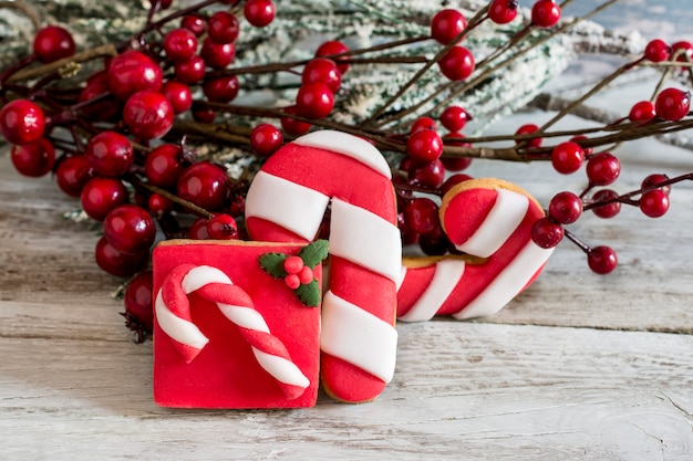 Butter cookie christmas next to holly branch